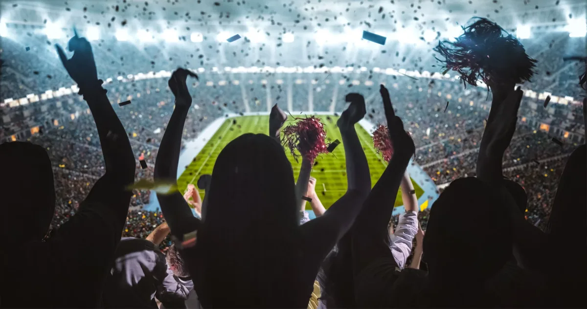 Supporters celebrating during a major football match